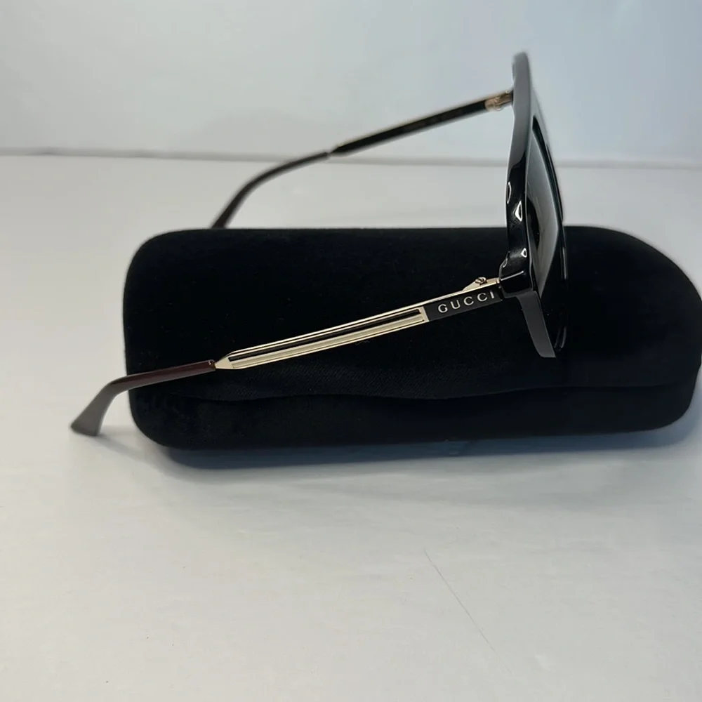 GUCCI GG0829SA 002 aviator sunglass black and ruthenium frame with green lenses.